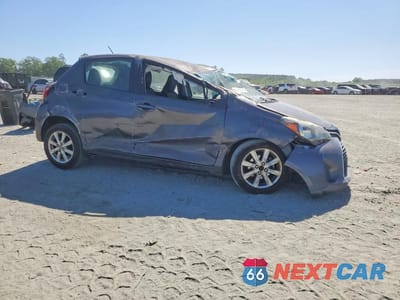Czwarte zdjęcie samochodu z boku: 2016 TOYOTA YARIS 5-DOOR LE VIN:VNKKTUD39GA061032 - miniatura