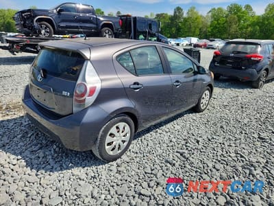 Trzecie zdjęcie samochodu z tyłu: 2014 TOYOTA PRIUS C ONE VIN:JTDKDTB34E1061293 - miniatura