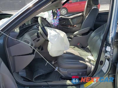 Zdjęcie 7 z 12 samochodu: 2003 TOYOTA AVALON XLS VIN:4T1BF28B33U296035 - miniatura