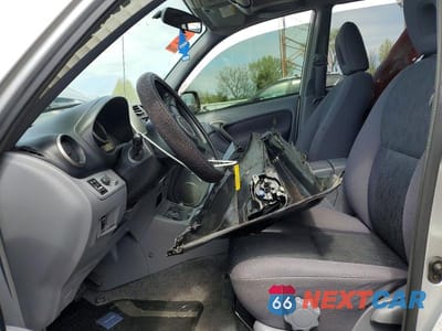 Zdjęcie 7 z 13 samochodu: 2002 TOYOTA RAV4 BASE VIN:JTEHH20V526038581 - miniatura