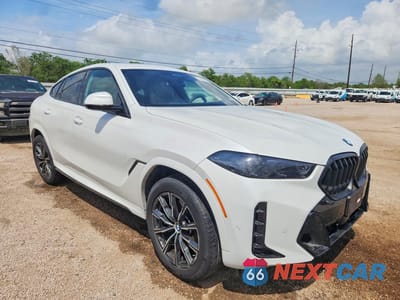 Czwarte zdjęcie samochodu z boku: 2026 BMW X6 XDRIVE40I VIN:5UX33EX06T9229594 - miniatura