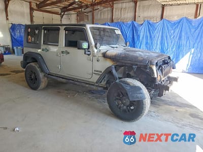 Czwarte zdjęcie samochodu z boku: 2010 JEEP WRANGLER UNLIMITED SPORT VIN:1J4BA3H16AL129360 - miniatura