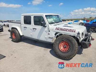 Czwarte zdjęcie samochodu z boku: 2021 JEEP GLADIATOR RUBICON VIN:1C6JJTBG8ML559045 - miniatura