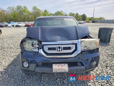 Piąte zdjęcie samochodu w środku: 2011 HONDA PILOT EXL VIN:5FNYF4H5XBB057786 - miniatura