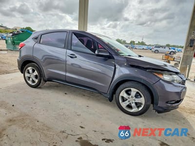 Czwarte zdjęcie samochodu z boku: 2016 HONDA HR-V LX VIN:3CZRU5H31GM719671 - miniatura
