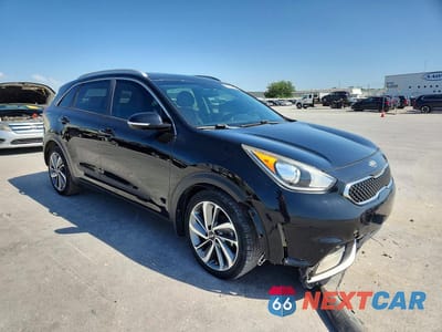 Czwarte zdjęcie samochodu z boku: 2017 KIA NIRO EX TOURING VIN:KNDCE3LC5H5052745 - miniatura