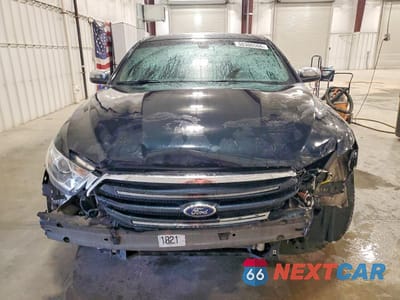Piąte zdjęcie samochodu w środku: 2014 FORD TAURUS LIMITED VIN:1FAHP2F86EG110823 - miniatura