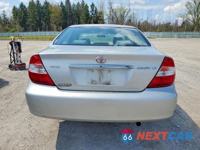 Zdjęcie 6 z 13 samochodu: 2003 TOYOTA CAMRY LE VIN:4T1BE32K23U707586 - miniatura