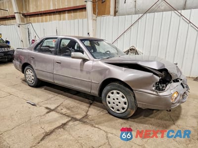 Czwarte zdjęcie samochodu z boku: 1995 TOYOTA CAMRY LE VIN:JT2SK12EXS0312579 - miniatura