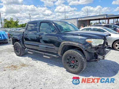 Czwarte zdjęcie samochodu z boku: 2020 TOYOTA TACOMA SR5 V6 VIN:3TMAZ5CN4LM136342 - miniatura
