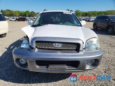 Piąte zdjęcie samochodu w środku: 2003 HYUNDAI SANTA FE GLS VIN:KM8SC13DX3U426856 - miniatura
