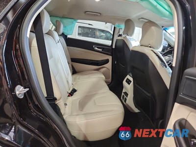 Zdjęcie 11 z 13 samochodu: 2019 FORD EDGE TITANIUM VIN:2FMPK4K94KBC02736 - miniatura