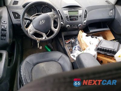 Zdjęcie 8 z 13 samochodu: 2010 HYUNDAI TUCSON GLS VIN:KM8JUCAC8AU046409 - miniatura