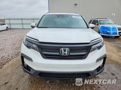 Piąte zdjęcie samochodu w środku: 2021 HONDA PILOT SE VIN:5FNYF5H2XMB017870 - miniatura