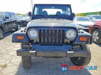 Piąte zdjęcie samochodu w środku: 2000 JEEP WRANGLER / TJ SE VIN:1J4FA29P5YP702511 - miniatura