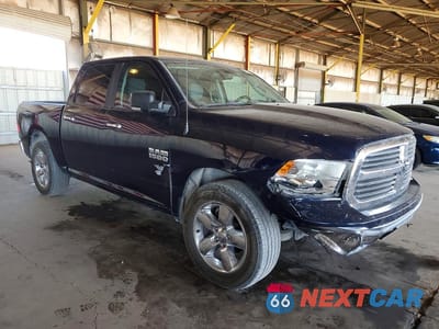 Czwarte zdjęcie samochodu z boku: 2018 RAM 1500 SLT VIN:1C6RR6LGXJS143530 - miniatura