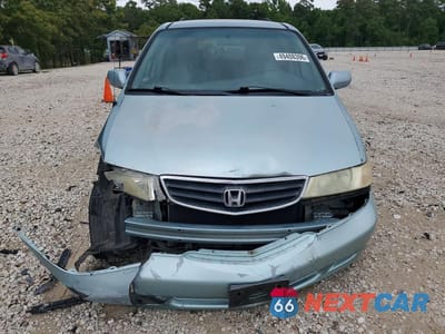 Piąte zdjęcie samochodu w środku: 2004 HONDA ODYSSEY EX VIN:5FNRL18674B056361 - miniatura