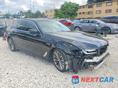 Czwarte zdjęcie samochodu z boku: 2021 BMW 530 I VIN:WBA53BH04MCF31185 - miniatura