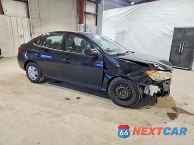 Czwarte zdjęcie samochodu z boku: 2010 HYUNDAI ELANTRA GLS VIN:KMHDU4AD3AU140211 - miniatura