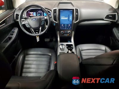 Zdjęcie 8 z 13 samochodu: 2021 FORD EDGE SEL VIN:2FMPK3J9XMBA23826 - miniatura