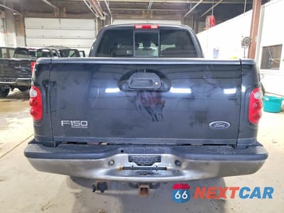 Zdjęcie 6 z 12 samochodu: 2003 FORD F150 SUPERCREW VIN:1FTRW08L03KB25738 - miniatura