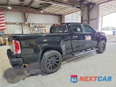 Trzecie zdjęcie samochodu z tyłu: 2018 GMC CANYON DENALI 4WD 2.8L 4C TDSL VIN:1GTP6EE14J1125834 - miniatura
