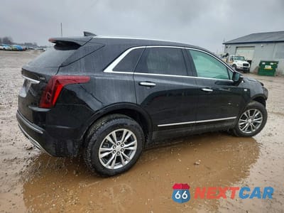 Trzecie zdjęcie samochodu z tyłu: 2022 CADILLAC XT5 PREMIUM LUXURY VIN:1GYKNDRS6NZ136717 - miniatura