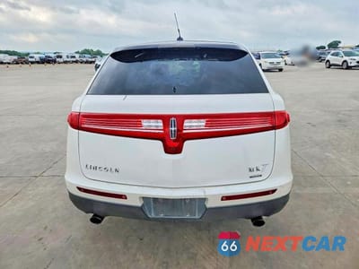 Zdjęcie 6 z 12 samochodu: 2012 LINCOLN MKT VIN:2LMHJ5AT9CBL55080 - miniatura