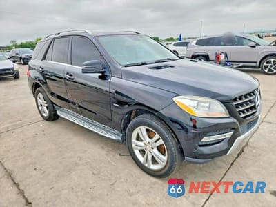 Czwarte zdjęcie samochodu z boku: 2012 MERCEDES-BENZ ML 350 BLUETEC VIN:4JGDA2EB2CA011502 - miniatura