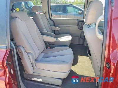 Zdjęcie 11 z 13 samochodu: 2009 KIA SEDONA LX VIN:KNDMB233X96318277 - miniatura