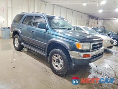 Czwarte zdjęcie samochodu z boku: 1998 TOYOTA 4RUNNER LIMITED VIN:JT3HN87R4W9015634 - miniatura