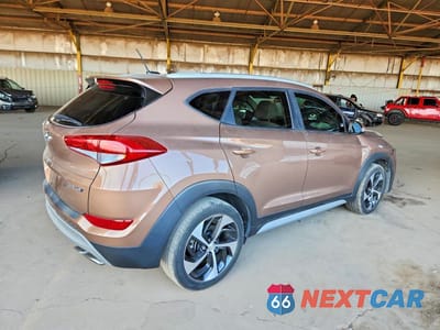 Trzecie zdjęcie samochodu z tyłu: 2017 HYUNDAI TUCSON SPORT VIN:KM8J33A28HU460245 - miniatura