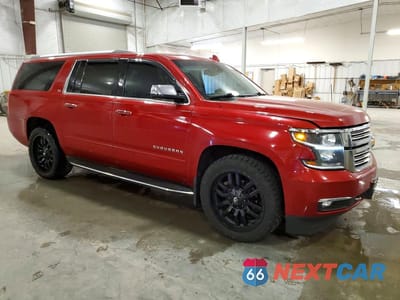 Czwarte zdjęcie samochodu z boku: 2015 CHEVROLET SUBURBAN K1500 LTZ VIN:1GNSKKKC4FR537049 - miniatura