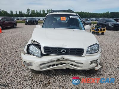 Piąte zdjęcie samochodu w środku: 1999 TOYOTA RAV4 BASE VIN:JT3HP10V7X7117595 - miniatura