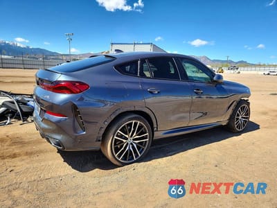 Trzecie zdjęcie samochodu z tyłu: 2022 BMW X6 XDRIVE40I VIN:5UXCY6C06N9N43066 - miniatura