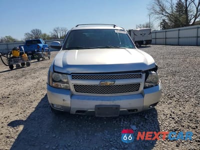 Piąte zdjęcie samochodu w środku: 2010 CHEVROLET SUBURBAN C1500 LT VIN:1GNUCJE01AR247863 - miniatura