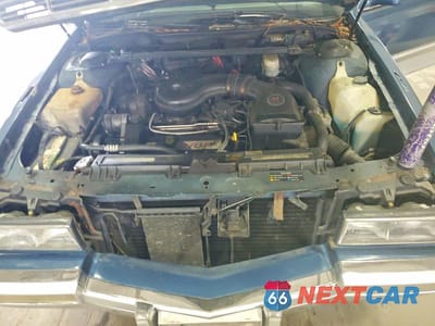 Zdjęcie 11 z 13 samochodu: 1992 CADILLAC DEVILLE VIN:1G6CD53B7N4251063 - miniatura