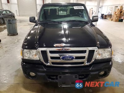 Piąte zdjęcie samochodu w środku: 2011 FORD RANGER SUPER CAB VIN:1FTLR4FE5BPA93279 - miniatura