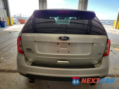 Zdjęcie 6 z 12 samochodu: 2013 FORD EDGE SEL VIN:2FMDK3JC7DBC84572 - miniatura