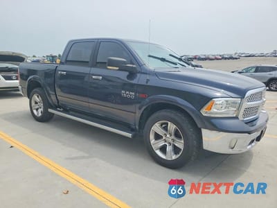 Czwarte zdjęcie samochodu z boku: 2015 RAM 1500 LARAMIE VIN:1C6RR7NM5FS556388 - miniatura