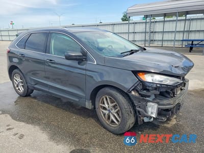 Czwarte zdjęcie samochodu z boku: 2021 FORD EDGE SEL VIN:2FMPK4J96MBA60233 - miniatura