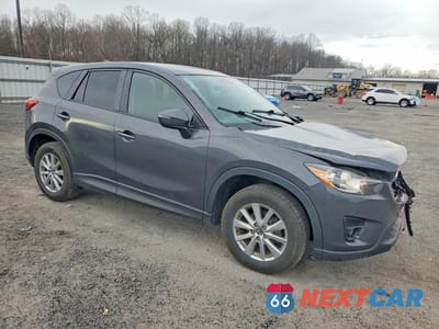 Czwarte zdjęcie samochodu z boku: 2016 MAZDA CX-5 TOURING VIN:JM3KE4CY7G0892980 - miniatura