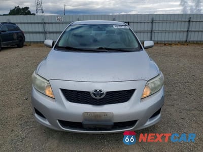 Piąte zdjęcie samochodu w środku: 2009 TOYOTA COROLLA LE VIN:1NXBU40E99Z151419 - miniatura