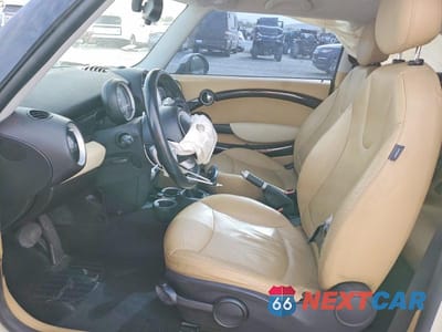 Zdjęcie 7 z 13 samochodu: 2007 MINI COOPER VIN:WMWMF33527TT51488 - miniatura