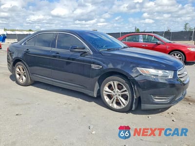 Czwarte zdjęcie samochodu z boku: 2016 FORD TAURUS SEL VIN:1FAHP2E8XGG112871 - miniatura