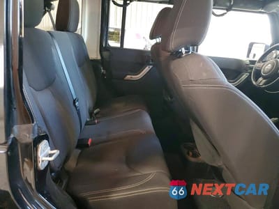 Zdjęcie 11 z 12 samochodu: 2013 JEEP WRANGLER UNLIMITED SAHARA VIN:1C4BJWEG3DL585465 - miniatura