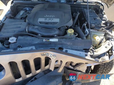 Zdjęcie 11 z 12 samochodu: 2013 JEEP WRANGLER UNLIMITED SAHARA VIN:1C4BJWEG5DL617770 - miniatura