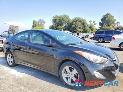 Czwarte zdjęcie samochodu z boku: 2012 HYUNDAI ELANTRA GLS VIN:KMHDH4AE1CU363220 - miniatura