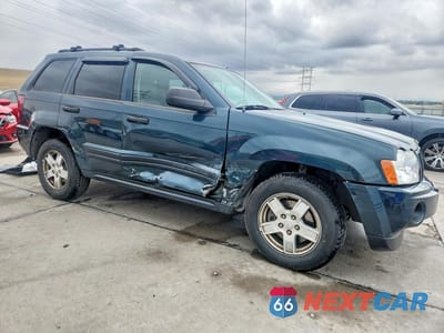 Czwarte zdjęcie samochodu z boku: 2005 JEEP GRAND CHEROKEE LAREDO VIN:1J4GR48K25C679092 - miniatura