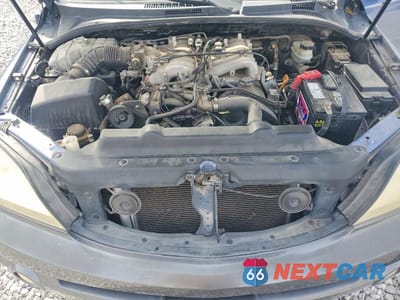 Zdjęcie 11 z 11 samochodu: 2004 KIA SORENTO LX VIN:KNDJD733545313433 - miniatura